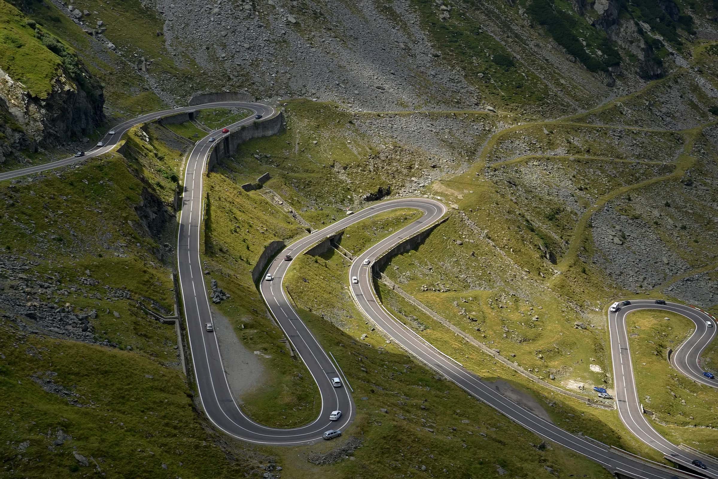 Hairpin bends of the Transfăgărășan road winding up the mountain