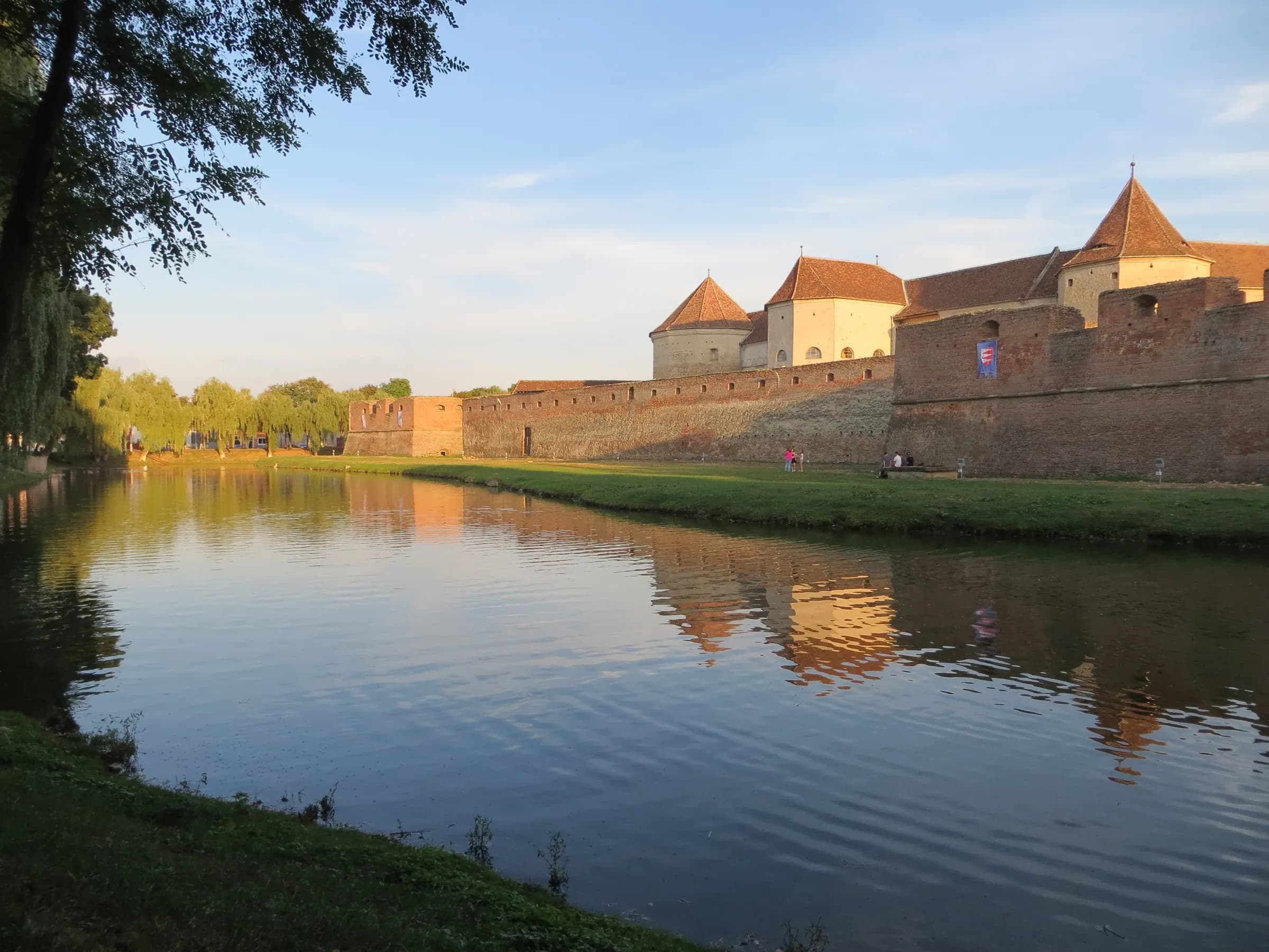 Făgăraș Fortress and its moat in evening light