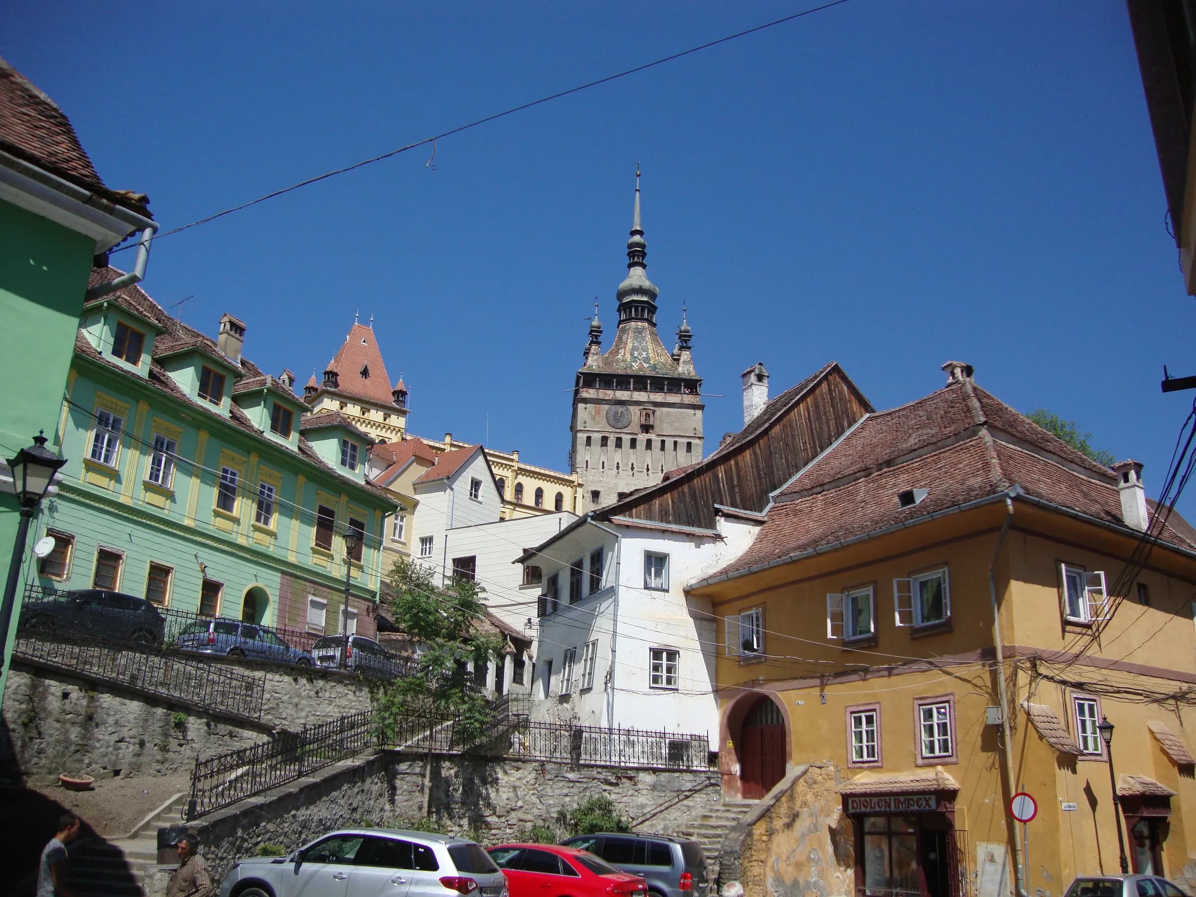 The Sighișoara clock tower above colourful old houses